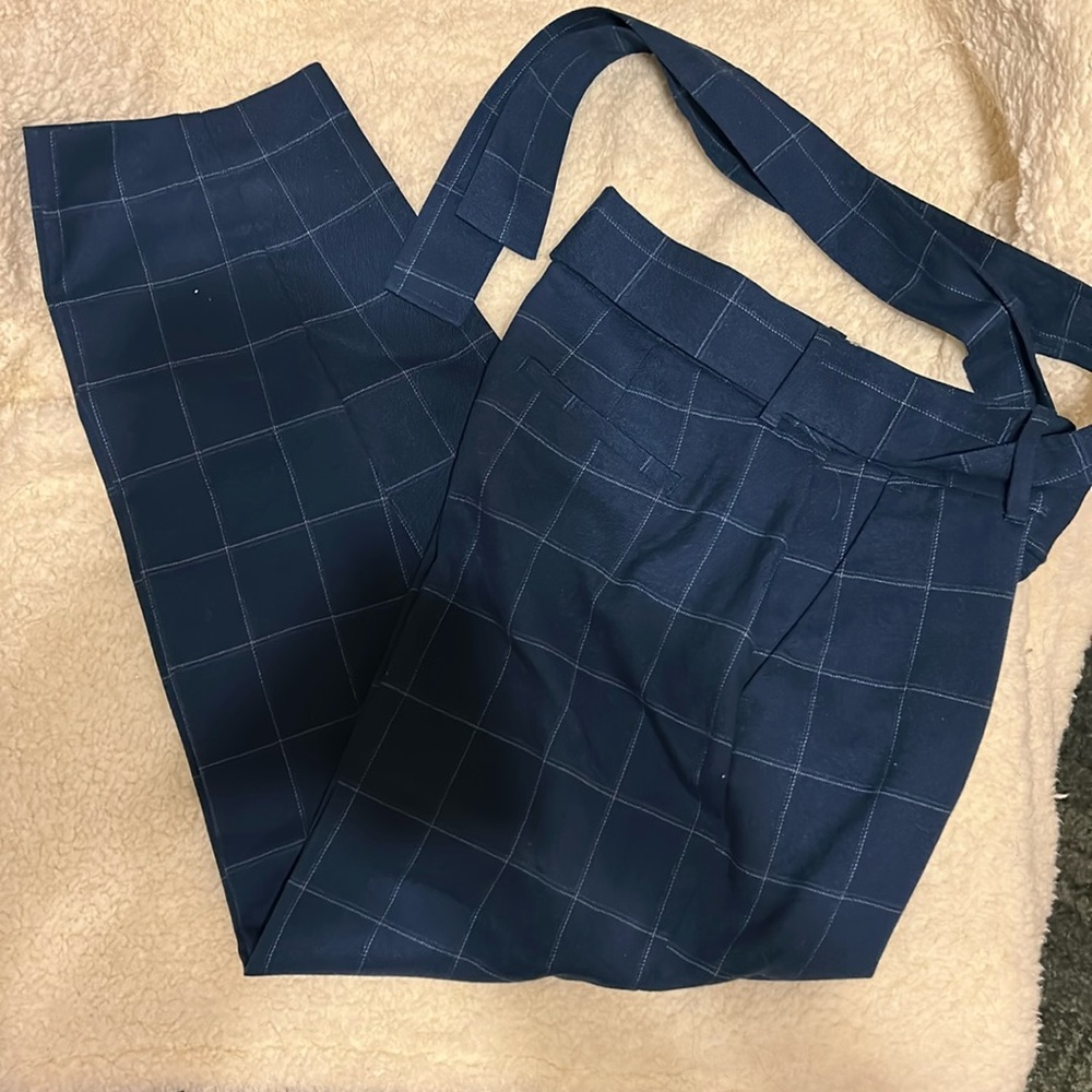 a new medium to dark blue trousers